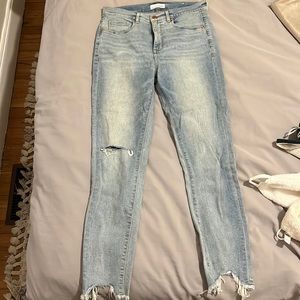 Ripped light wash skinny jeans